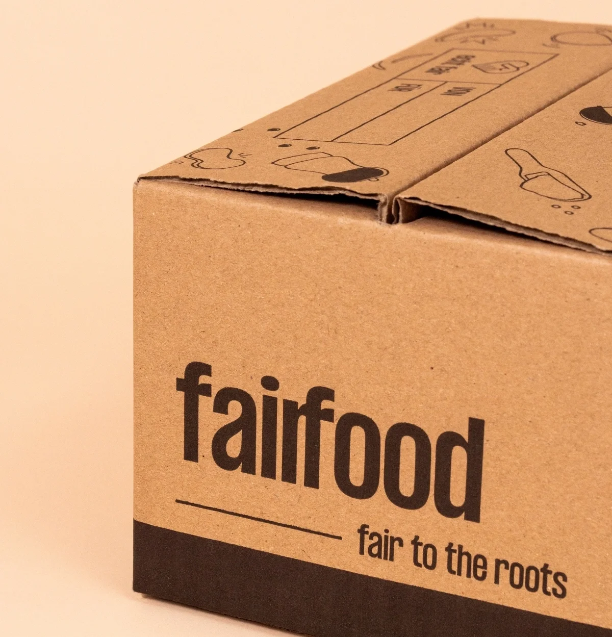 Pappkarton mit fairfood Logo