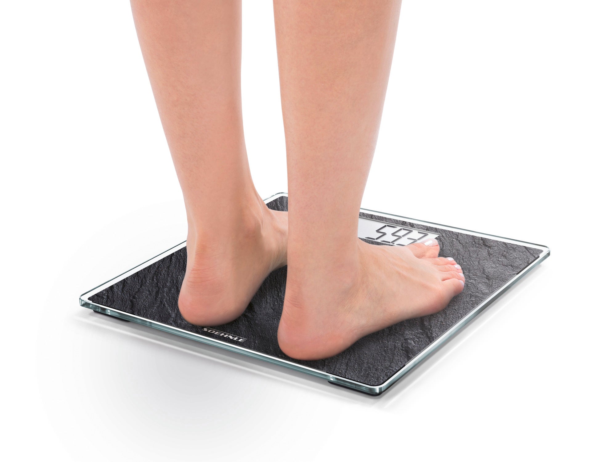 Style Sense Compact 300 Nature Edition digital bathroom scales in slate look. Shows feet on the scales, which have a modern and elegant design. Ideal for precise weight measurements.