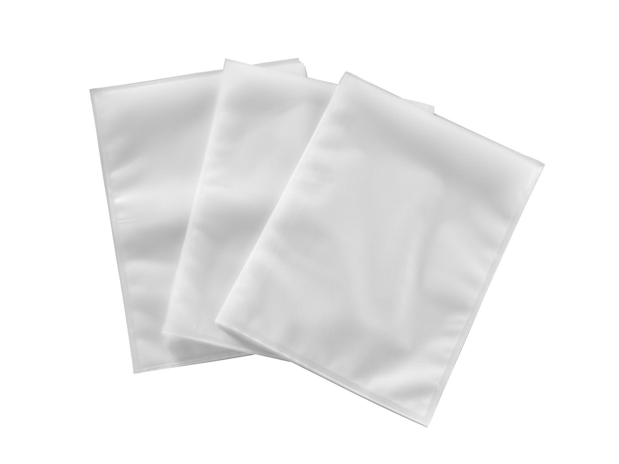 Drei weiße Vakuumbeutel in der Größe 30x40 cm liegen auf einem schwarzen Hintergrund. Sie sind glatt und unbedruckt, ideal zur Aufbewahrung von Lebensmitteln oder anderen Gegenständen.