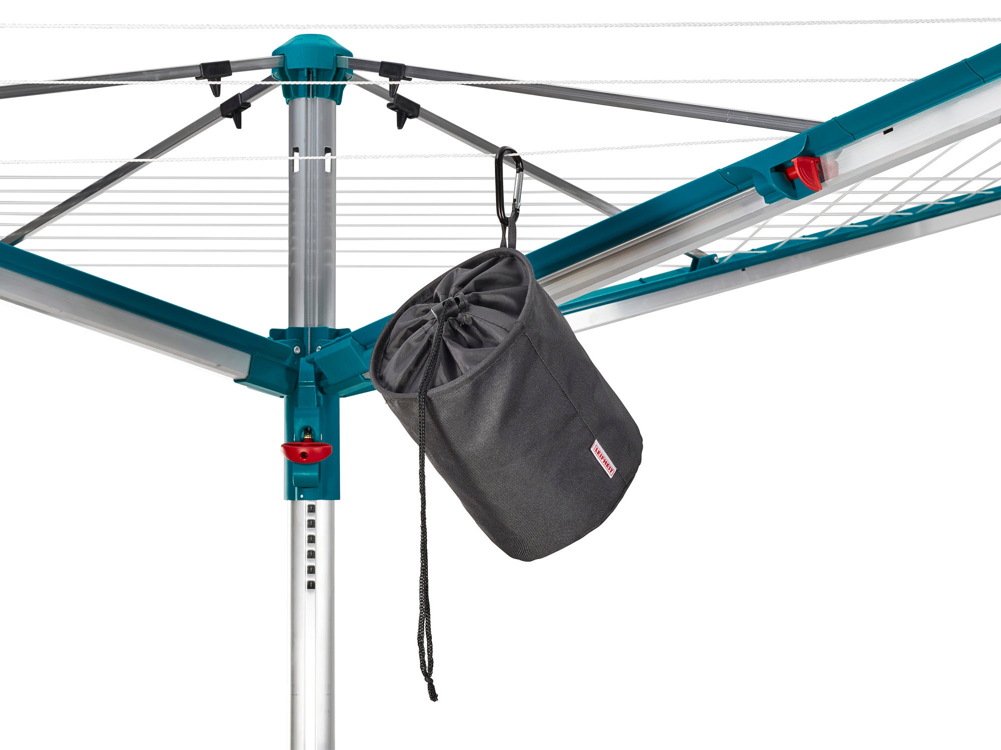 Clothespin bag attached to a clothes horse. The bag is black and cylindrical, ideal for storing clothespins. Practical and easy to access.