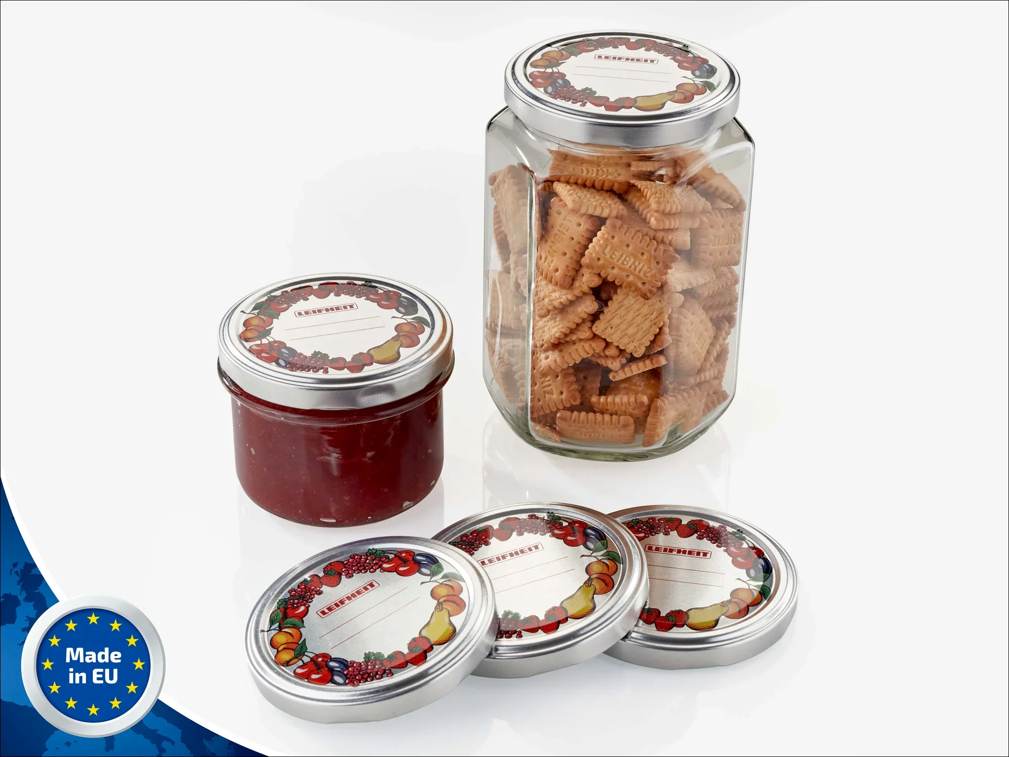 Ersatzdeckel für Sturzglas von Leifheit, passend für 235 ml Gläser. Das Bild zeigt Gläser mit Keksen und Marmelade, sowie drei zusätzliche Deckel. Hergestellt in der EU.