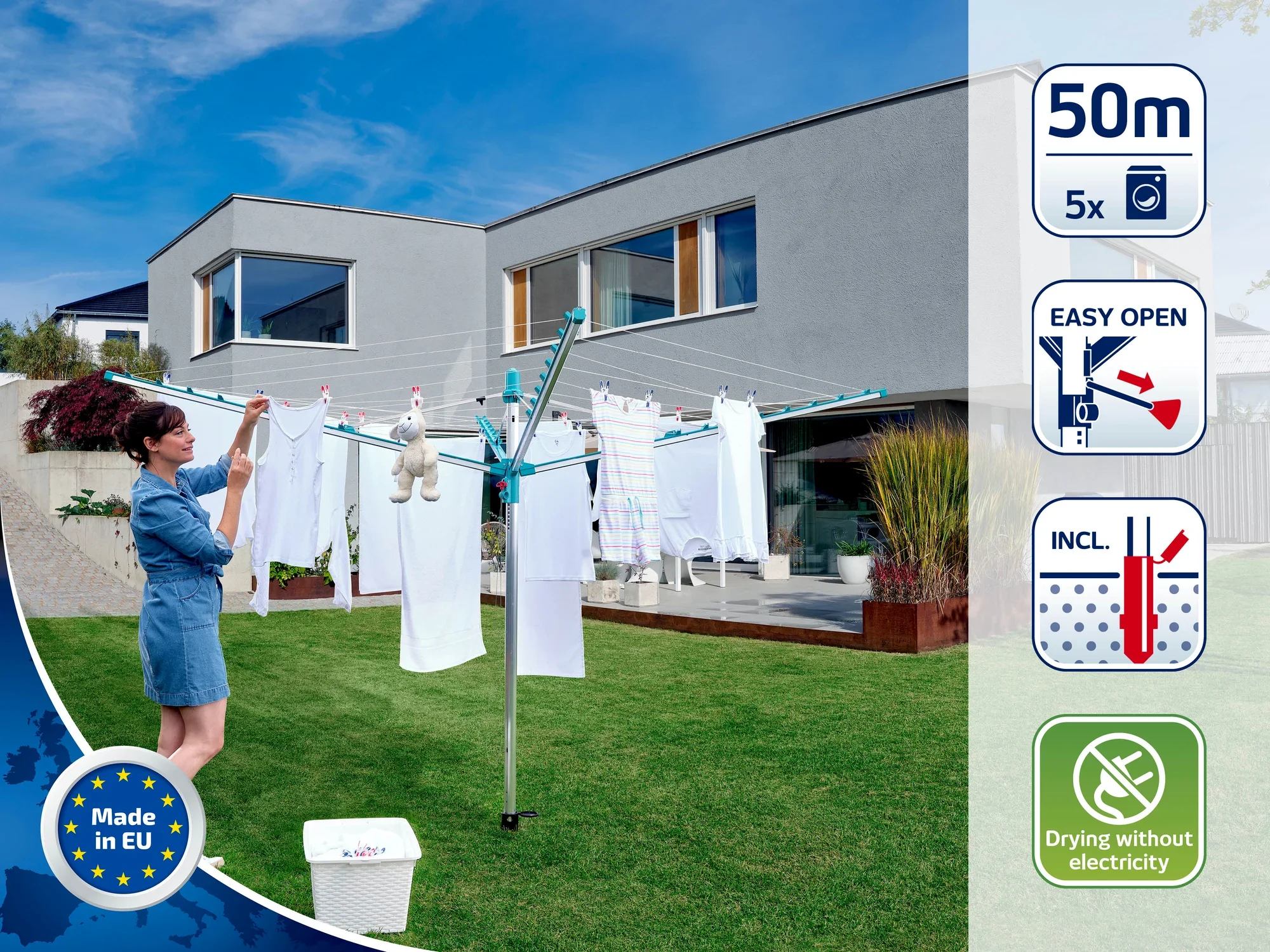 Kobieta wiesza pranie na suszarce obrotowej w ogrodzie. Suszarka obrotowa ma 50 metrów linki i można ją łatwo otworzyć. Idealna do ekologicznego suszenia bez użycia prądu.