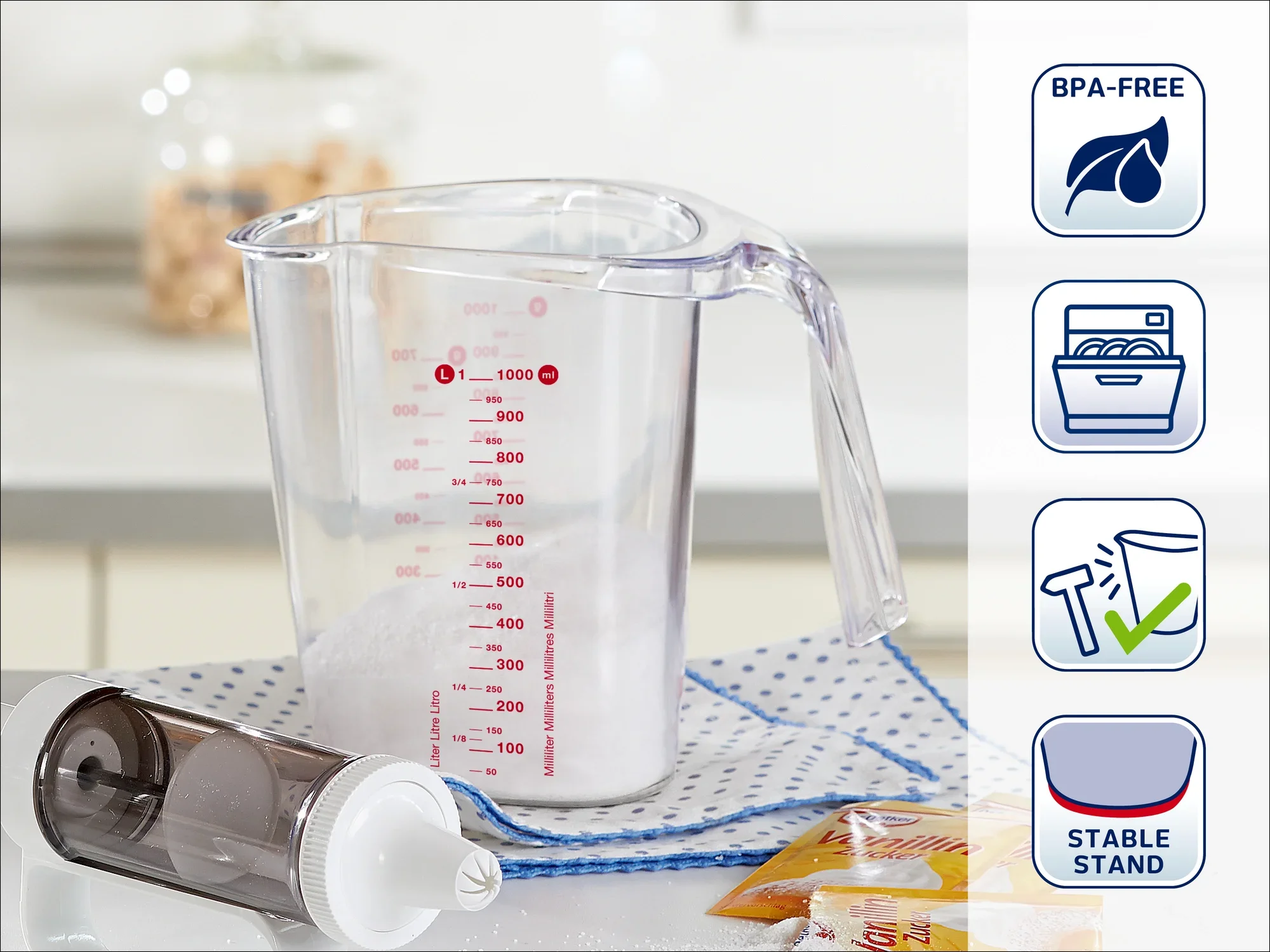 Vaso medidor con asa y escala graduada, sin BPA. Ideal para medir líquidos con precisión. Apto para lavavajillas y estable. Perfecto para cualquier cocina.