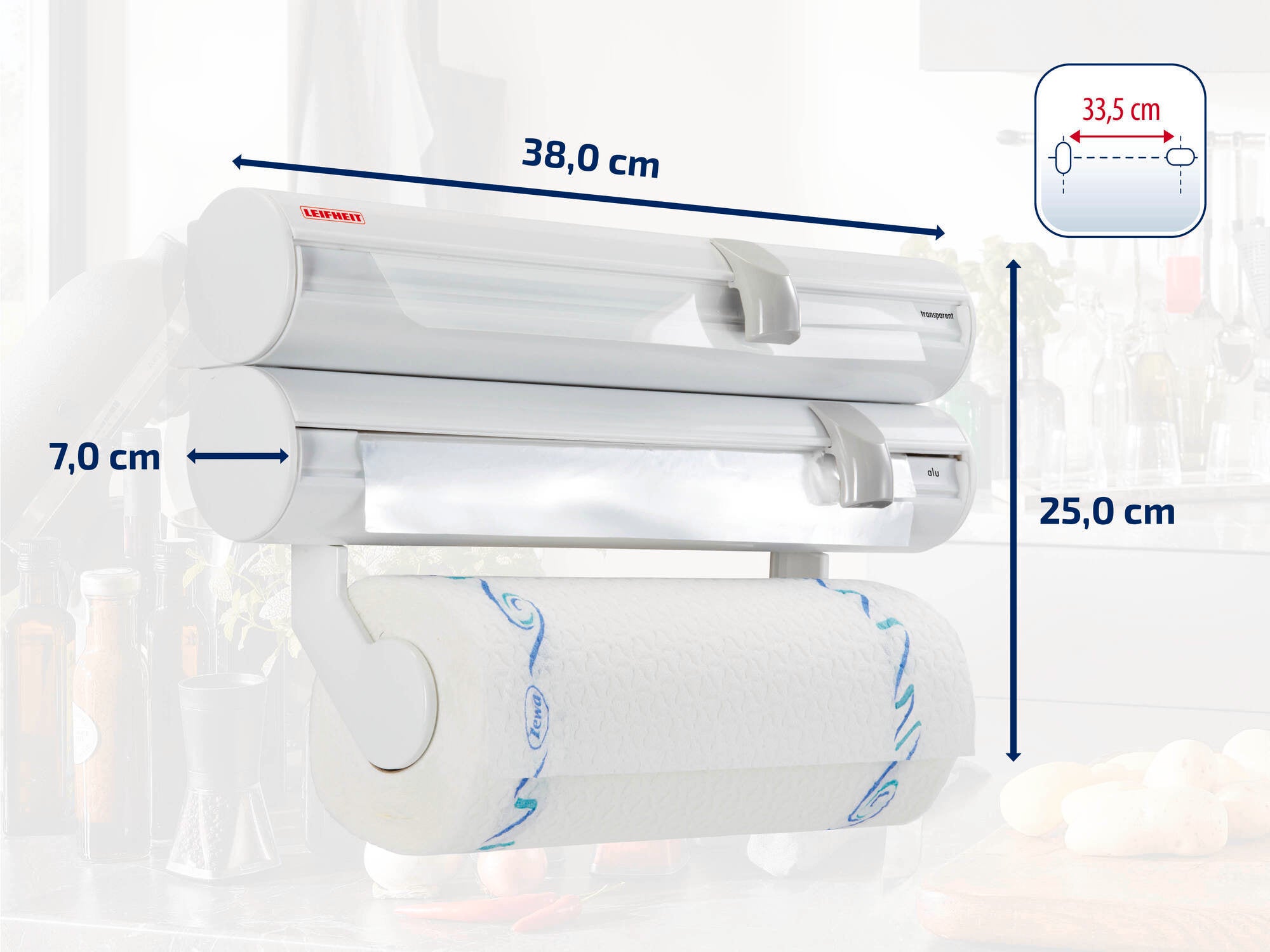Support mural pour rouleaux de Leifheit avec trois supports pour films alimentaires et rouleaux de papier essuie-tout. Dimensions : 38 cm de largeur, 25 cm de hauteur, 7 cm de profondeur. Pratique pour la cuisine afin d'avoir les films alimentaires et les