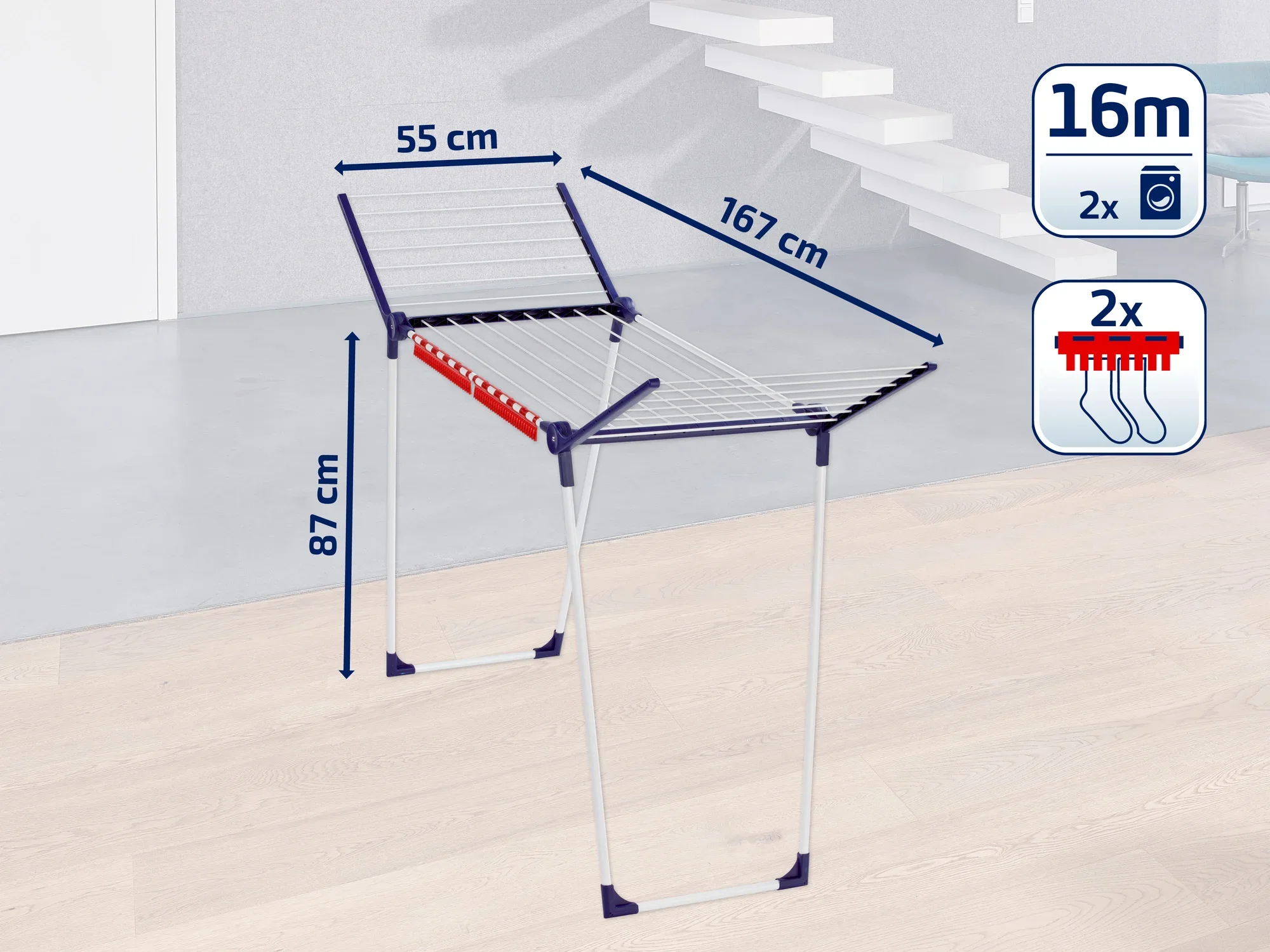 Wolnostojąca suszarka o wysokości 87 cm, szerokości 55 cm i długości 167 cm. Oferuje 16 metrów długości suszenia i posiada dwa uchwyty na drobne przedmioty. Idealna do użytku w pomieszczeniach.