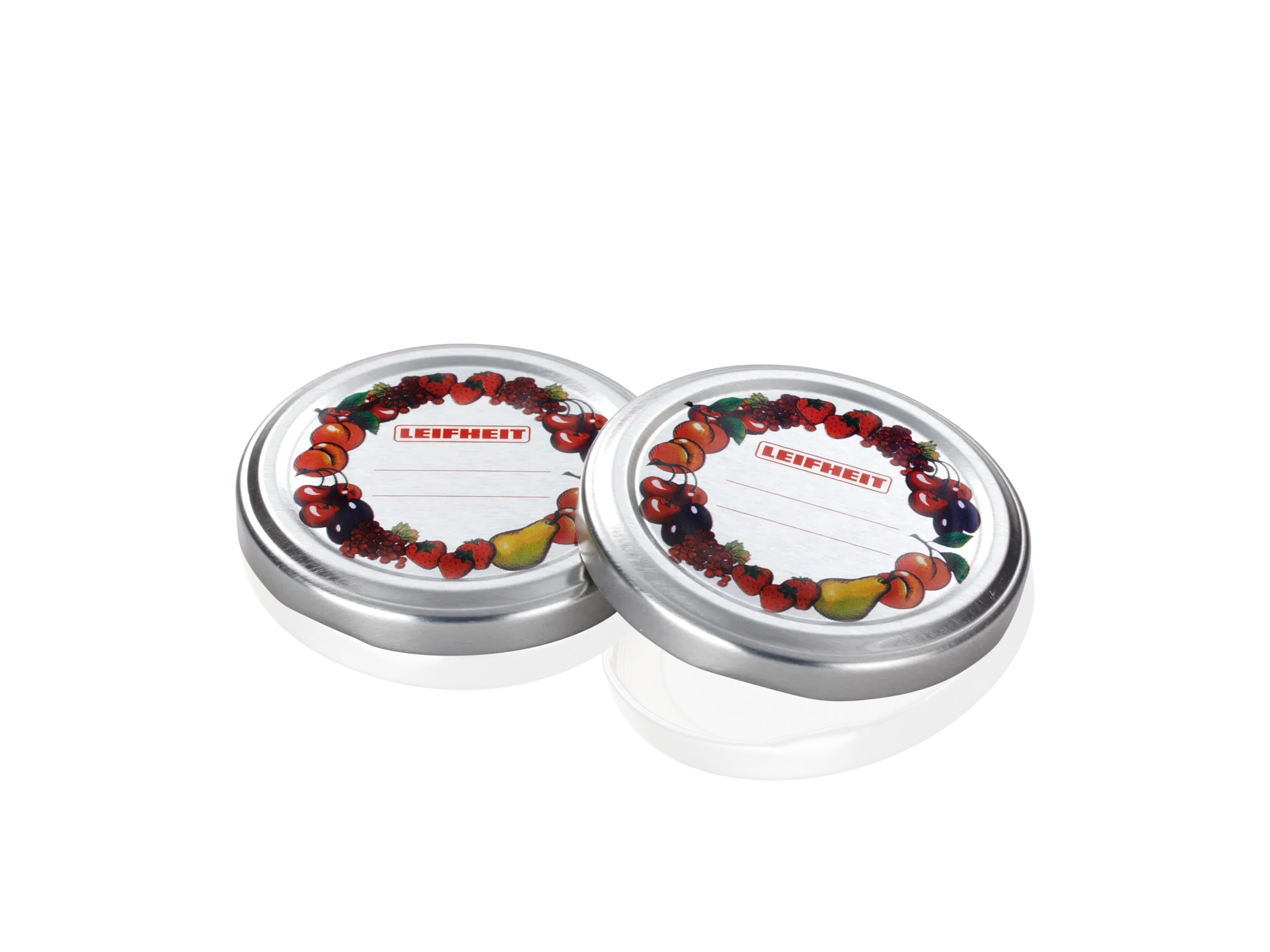 Twee zilveren vervangdeksels met een decoratief fruitpatroon en een etiketveld. Ideaal voor het inmaken van potten om voedsel vers te houden.