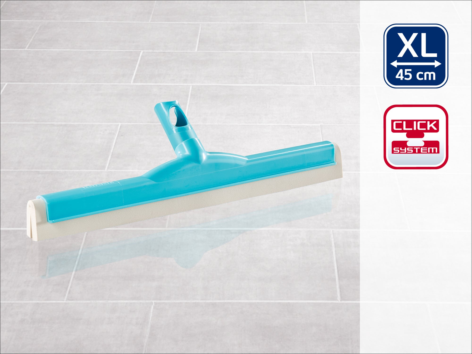 Zuigmond XL 45 cm met kliksysteem. De turquoise zuigmond ligt op een grijze tegelvloer. Ideaal voor grote oppervlakken, gemakkelijk te hanteren en compatibel met het Click systeem.