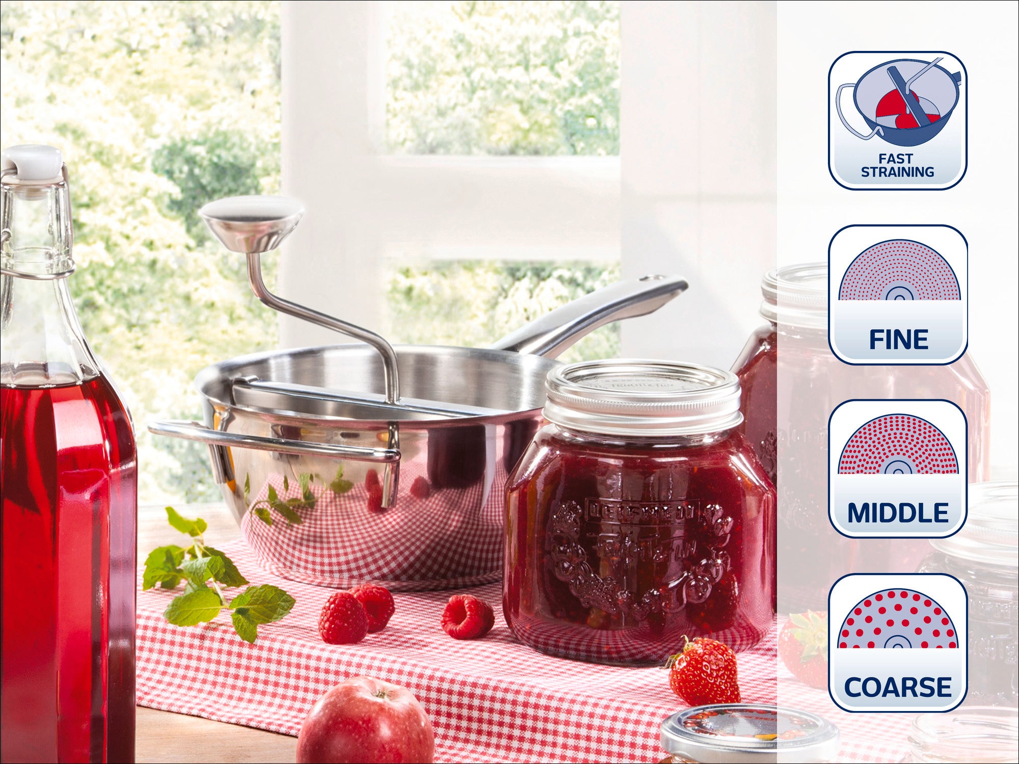 A kitchen sieve set with different sieve sizes: fine, medium and coarse. Ideal for straining liquids. In the background, you can see glasses with red juice and fresh raspberries.