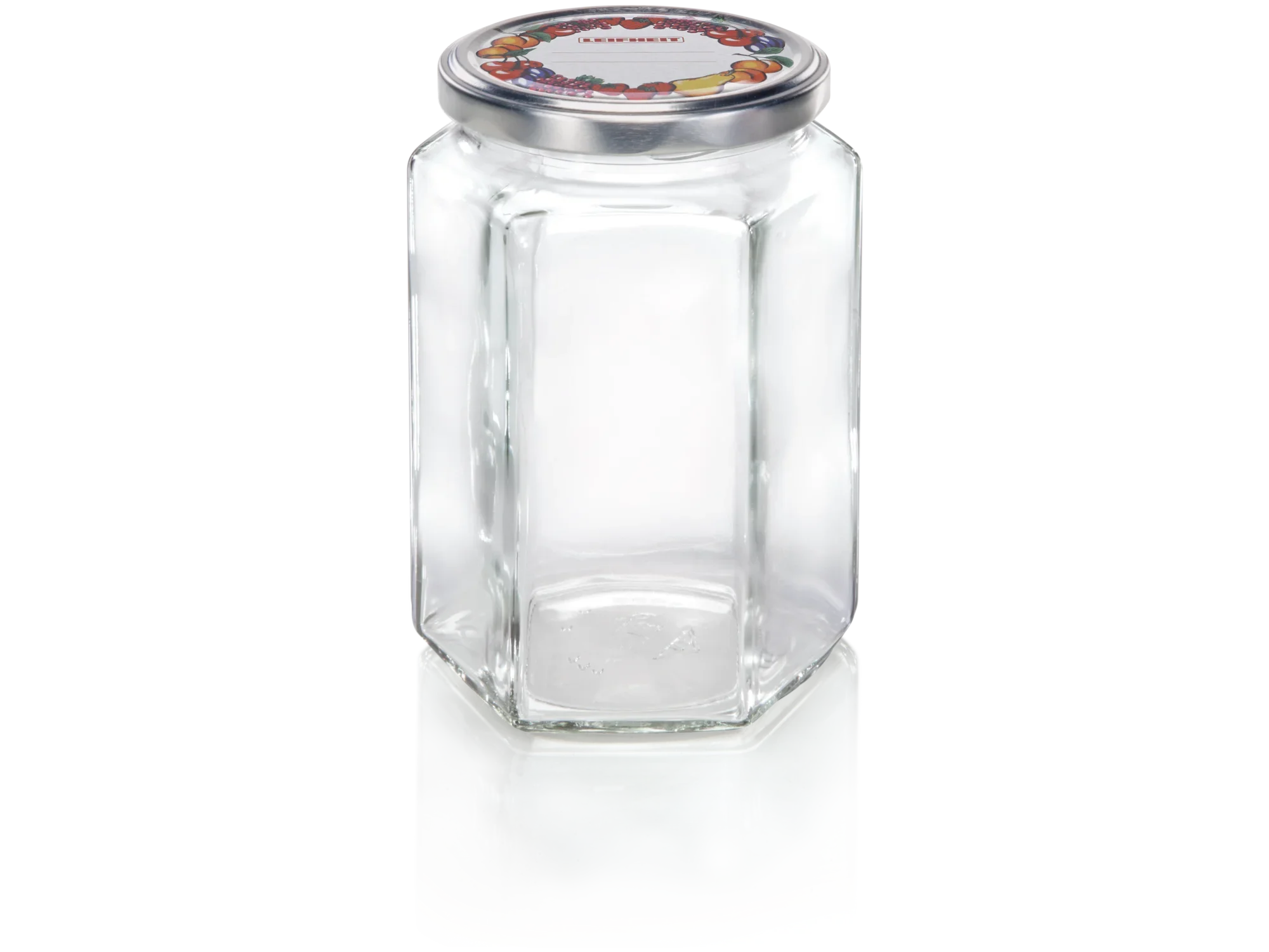 Pot hexagonal d'une contenance de 770 ml. Le pot a une forme hexagonale et un couvercle argenté avec un motif coloré. Idéal pour conserver les aliments.