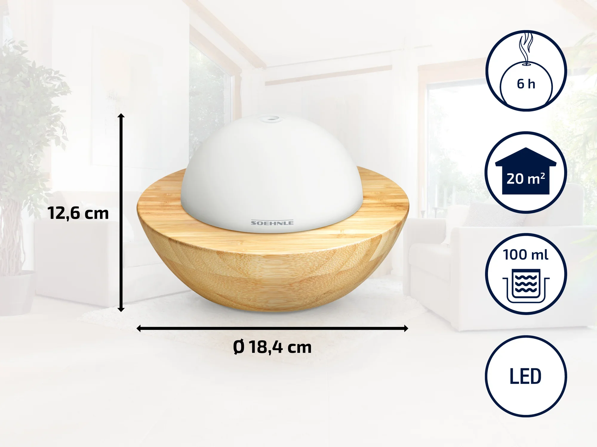 A round humidifier with a wood look and white lid. It has a diameter of 18.4 cm and a height of 12.6 cm. Suitable for rooms up to 20 m², with a capacity of 100 ml and LED lighting. Runtime up to 6 hours.