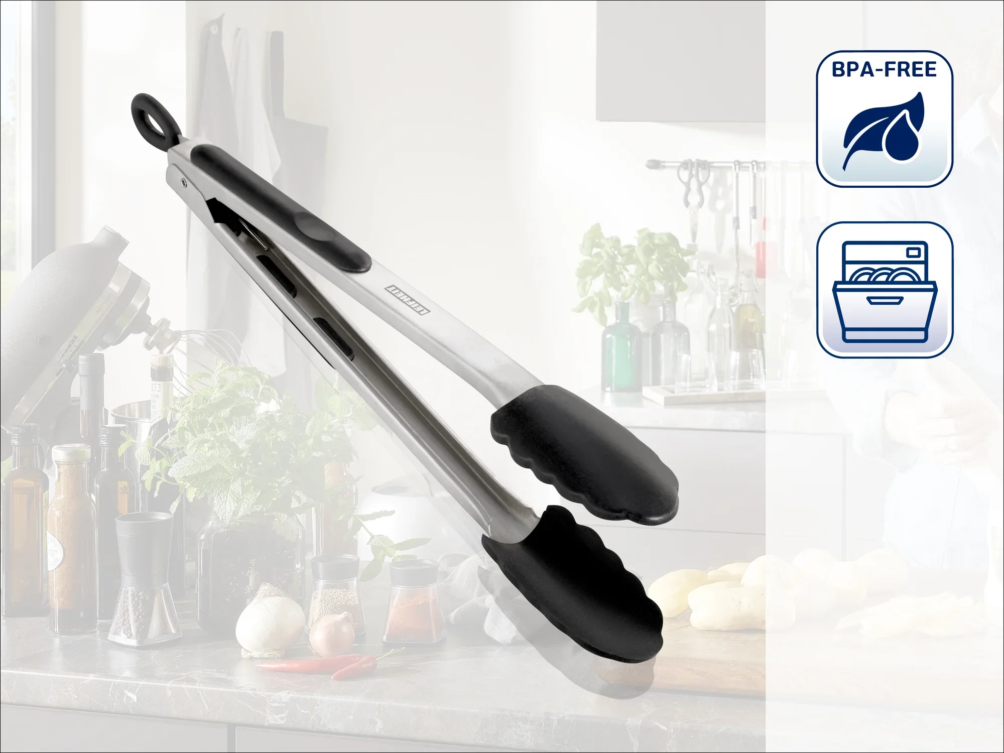 Szczypce kuchenne ze stali nierdzewnej z czarnymi silikonowymi końcówkami, idealne do chwytania żywności. Nie zawierają BPA i nadają się do mycia w zmywarce, doskonale prezentują się w nowoczesnej kuchni.