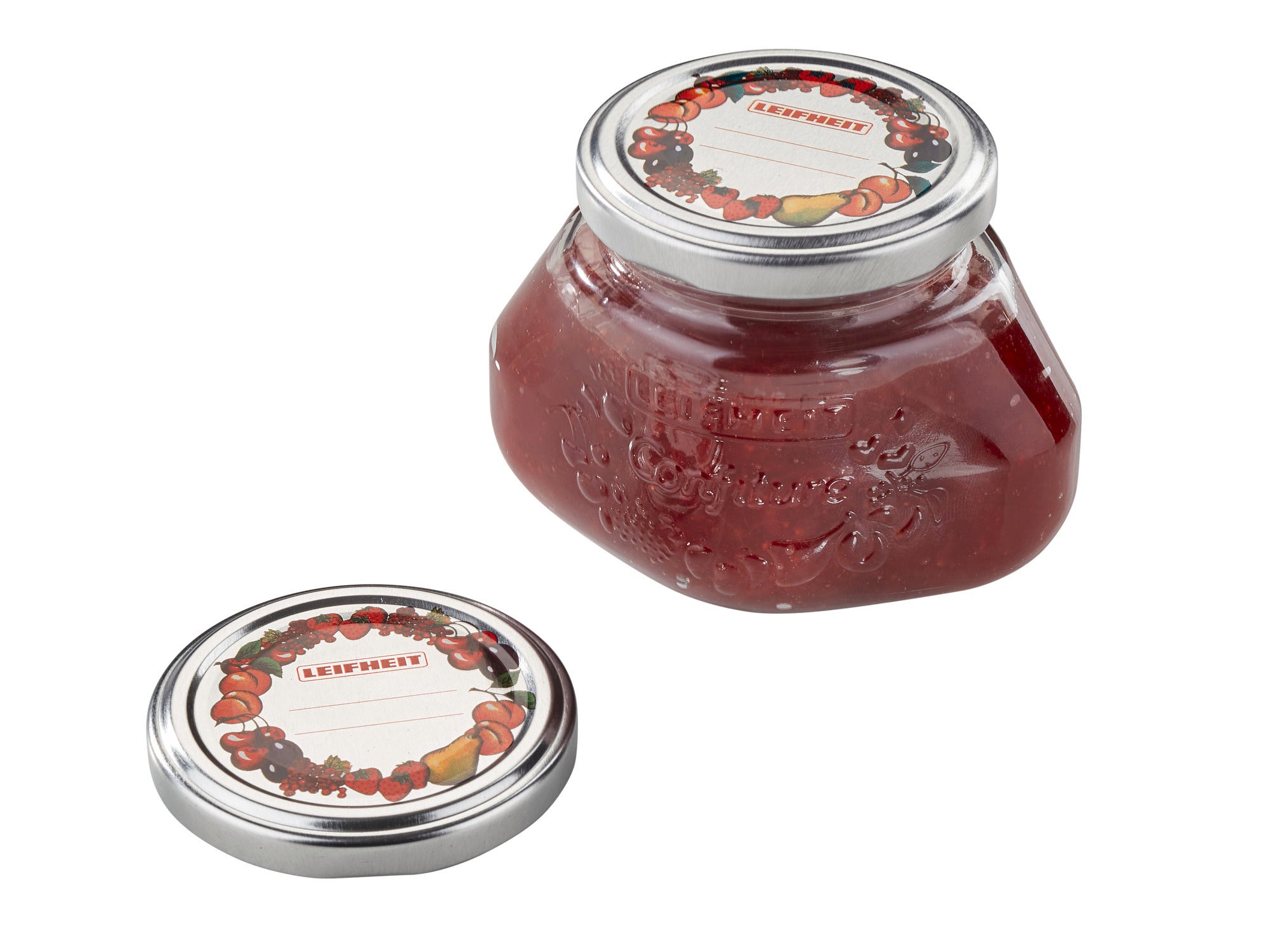 Coperchio di ricambio 66 mm: un barattolo con contenuto rosso e coperchio rimovibile. Il coperchio presenta un motivo decorativo a forma di frutta. Ideale per confetture e marmellate.