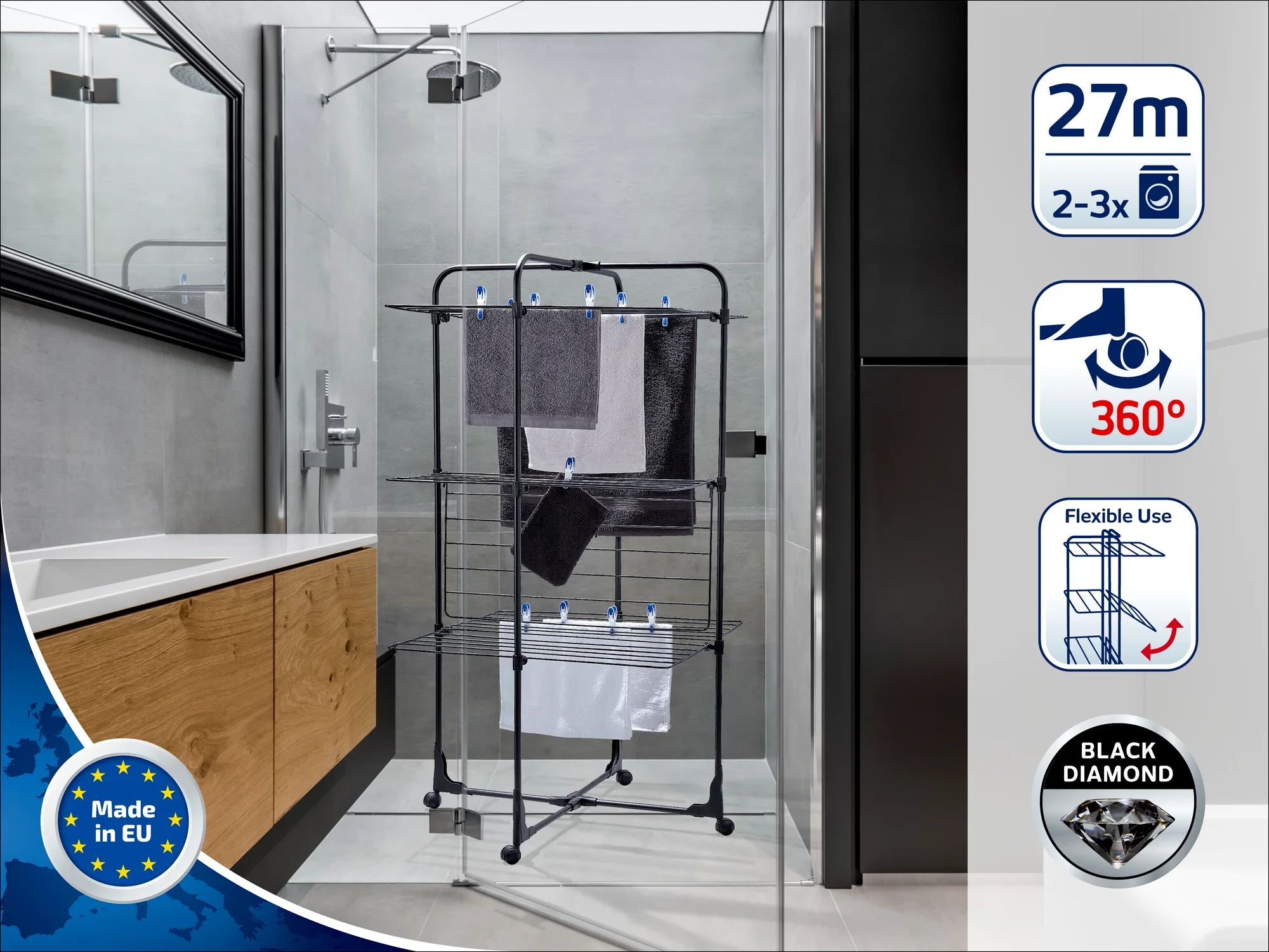 A tower dryer stands in a modern bathroom with a glass shower. It offers 27 metres of drying length, is flexible in use and has a 360-degree rotation function. Made in the EU.
