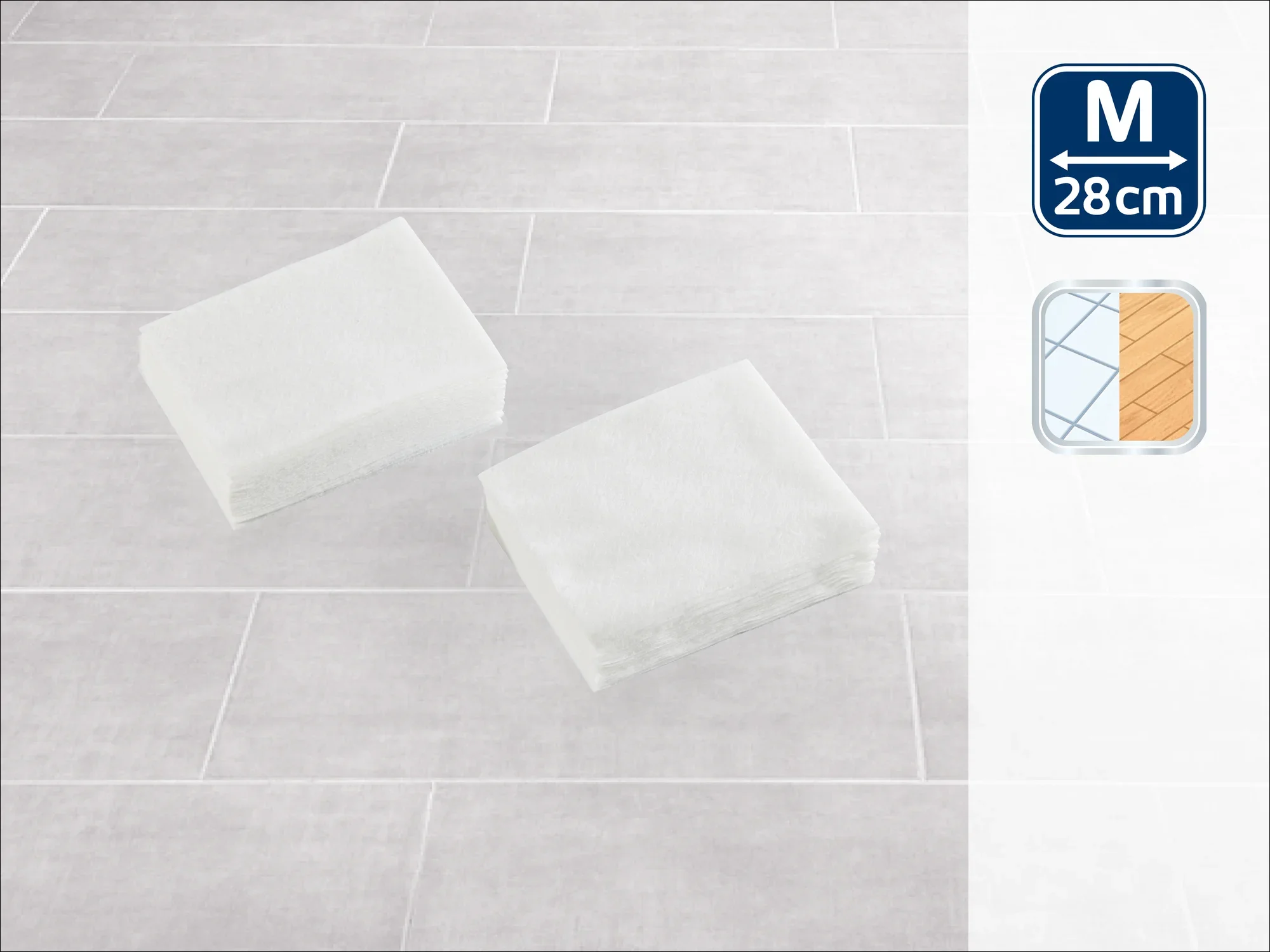 Dos paños de limpieza blancos y rectangulares sobre un suelo de baldosas gris claro. En la parte superior derecha hay un símbolo con el tamaño «M» y 28 cm. Ideal para tareas de limpieza versátiles.