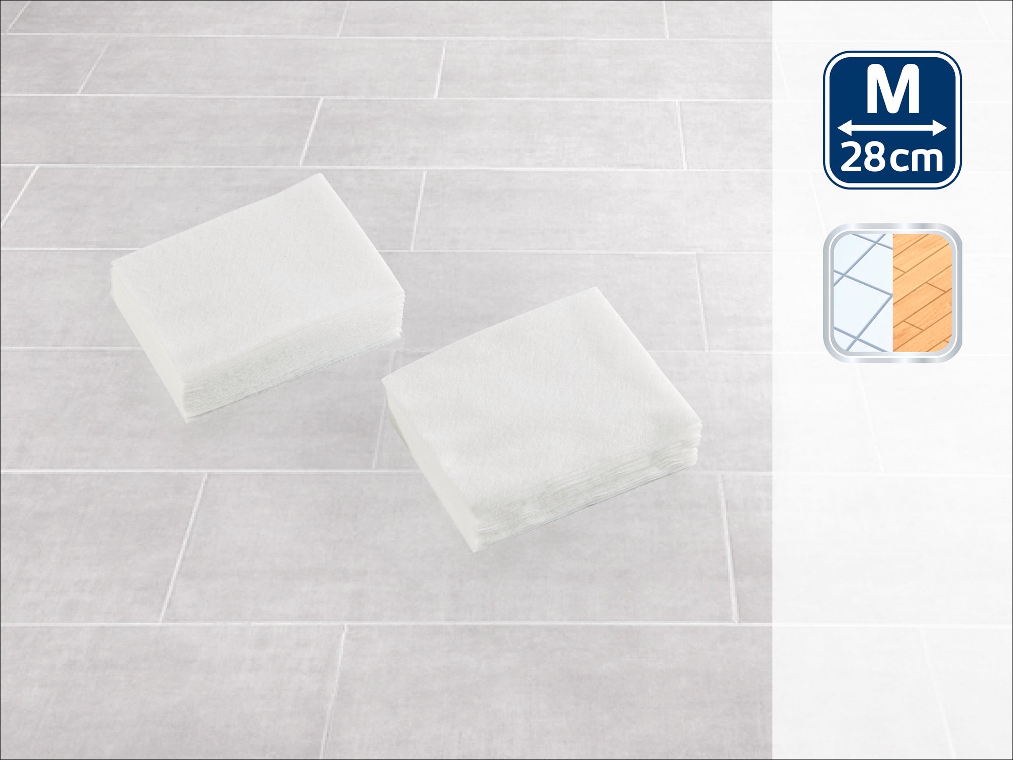 Deux chiffons de nettoyage blancs et rectangulaires sont posés sur un sol carrelé gris clair. En haut à droite, un symbole de taille « M » et 28 cm est représenté. Idéal pour des tâches de nettoyage variées.