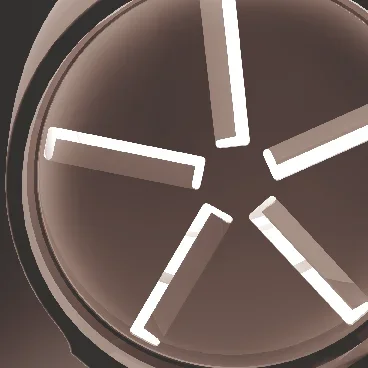 Close-up van de knoflooksnijder. Op de foto zie je de scherpe messen van de knoflooksnijder in een cirkelvormig patroon, ideaal om efficiënt knoflookteentjes te snijden.