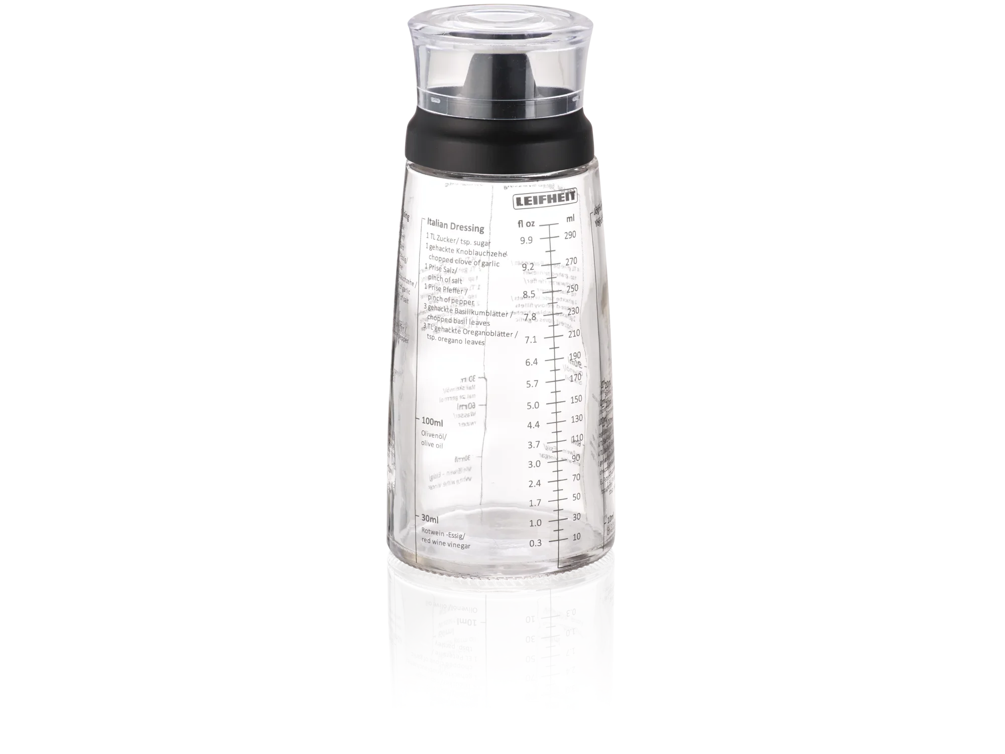 Salade dressing shaker gemaakt van helder glas met zwart deksel. De shaker heeft een maatverdeling en receptinformatie op de zijkant, ideaal voor het mengen van dressings.