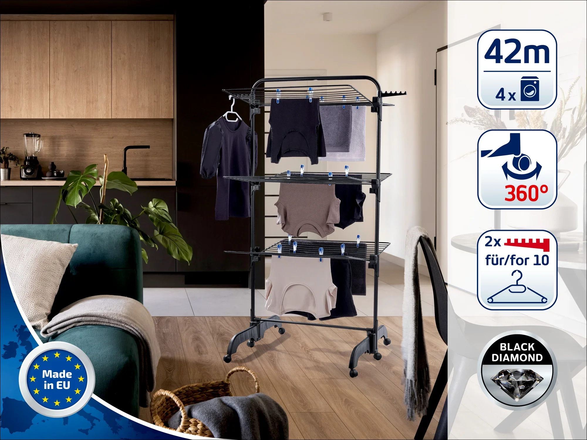 Un séchoir à tour dans un salon moderne. Le séchoir offre une longueur de séchage de 42 mètres, est équipé de roulettes à 360 degrés et peut accueillir quatre machines de linge.