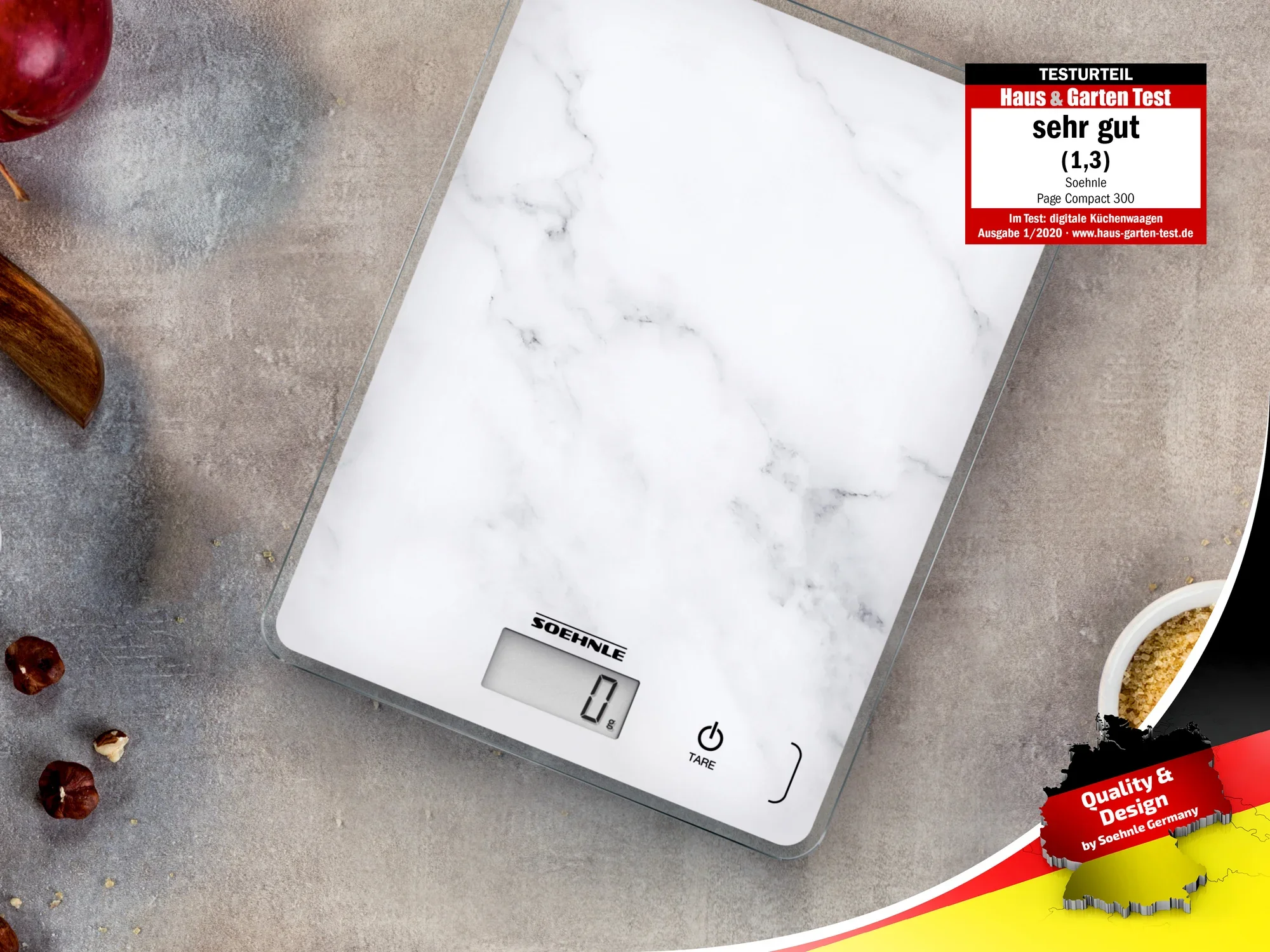 Soehnle kitchen scales with marble design on a worktop. The digital display shows 0.0. Awarded "very good" in the Haus & Garten test.