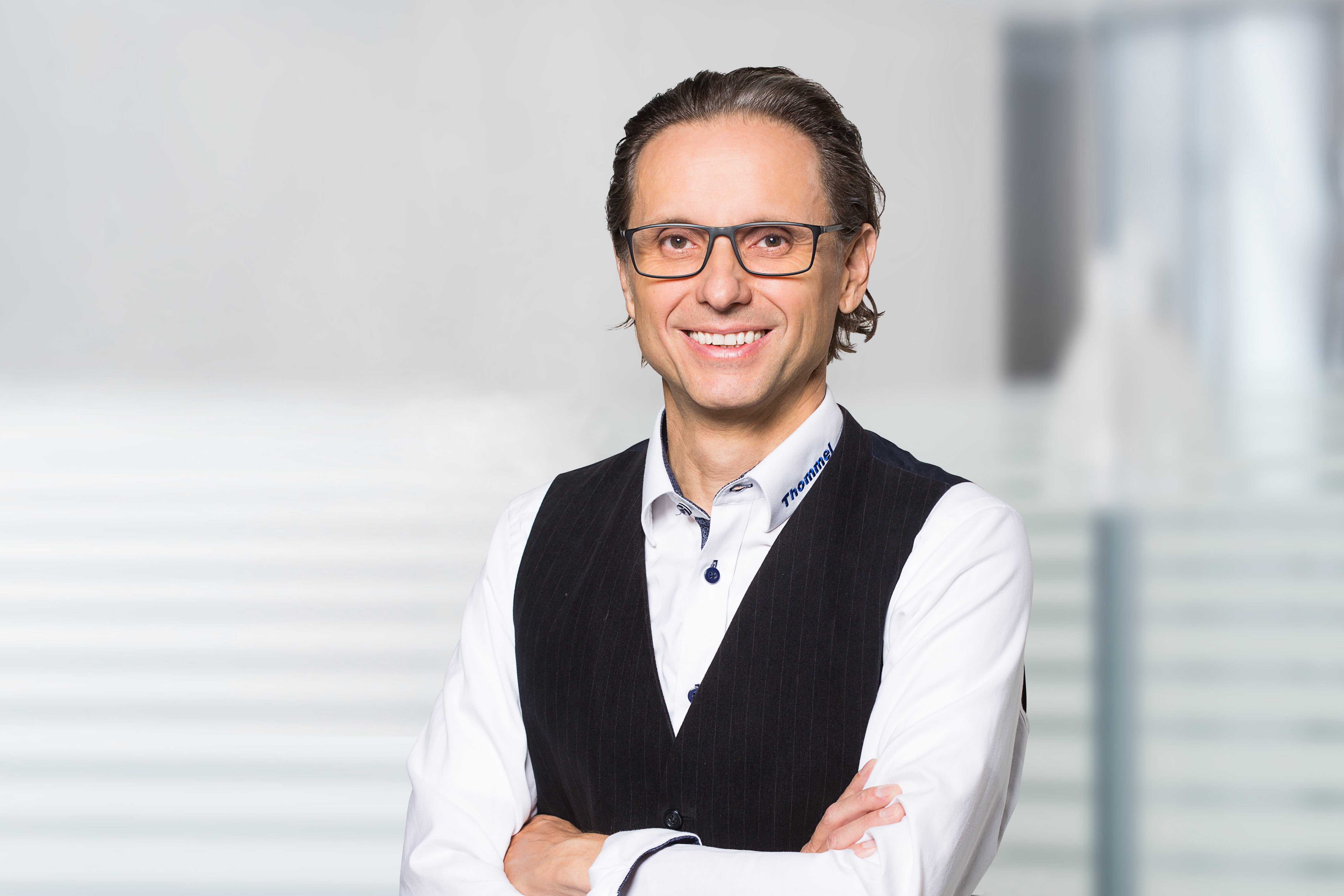 man, glasses, vest, white shirt, professional