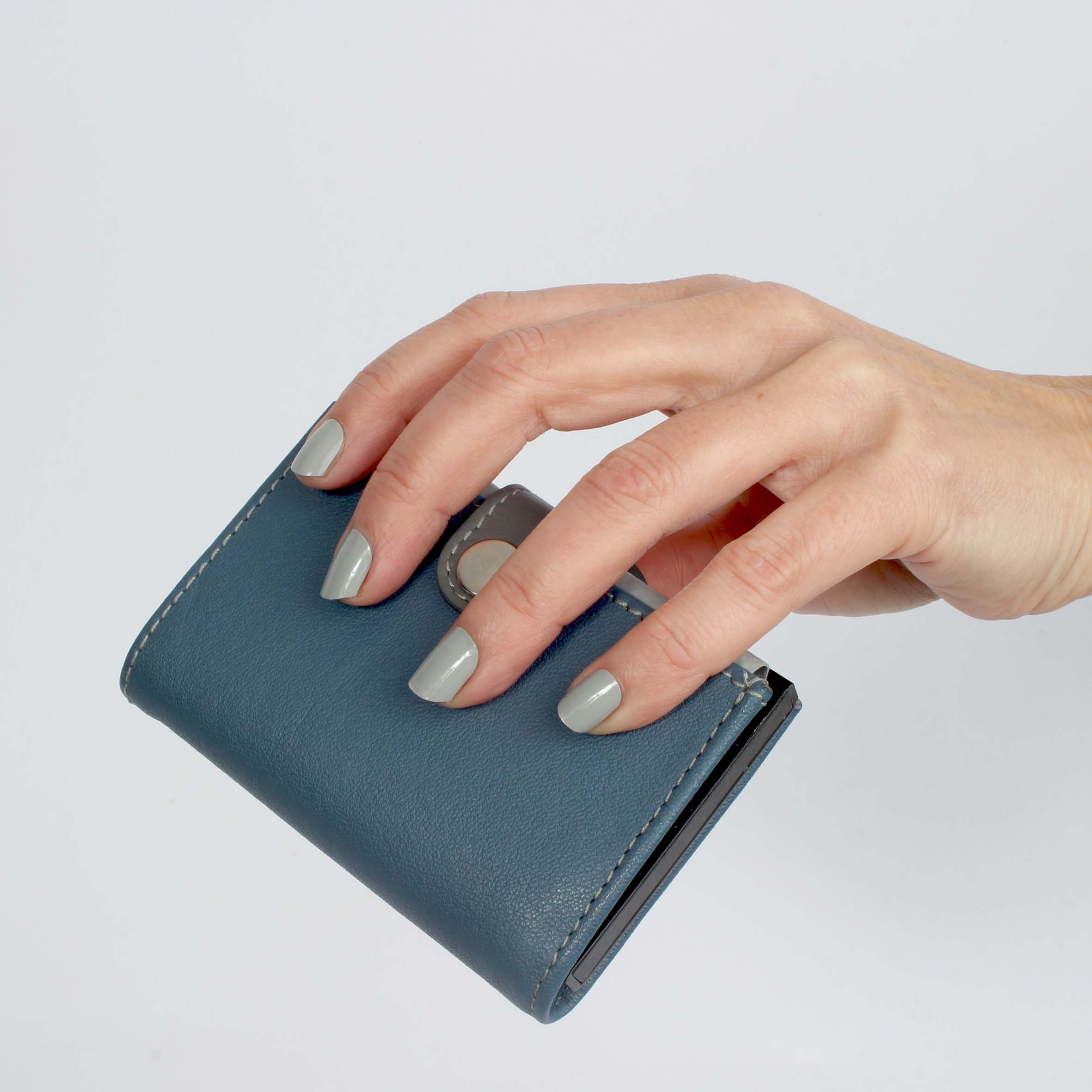 Laued fingernail wraps statement morning fog hand with wallet