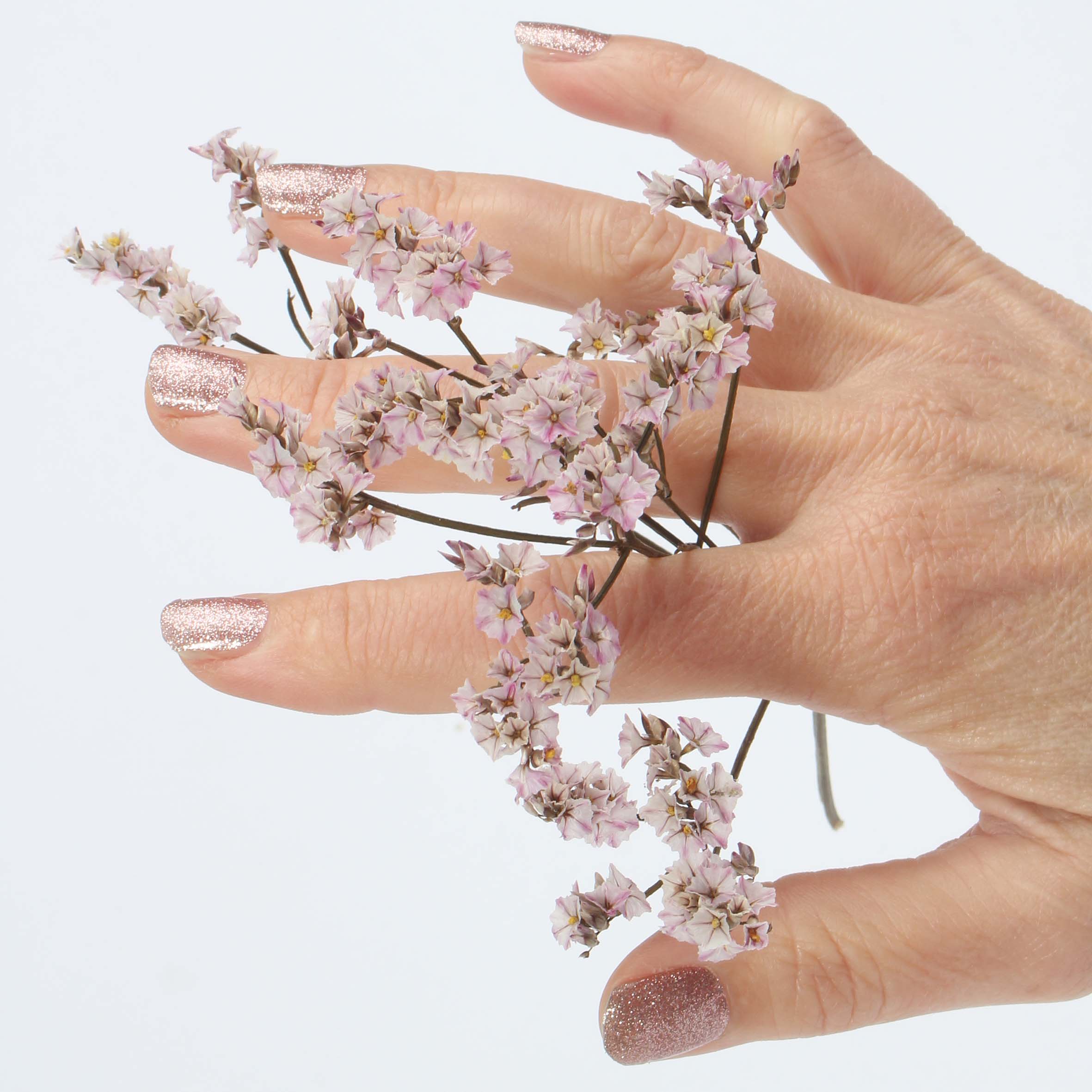 Laued Nagelfolien glitter sparkling candy Hand mit Blumen